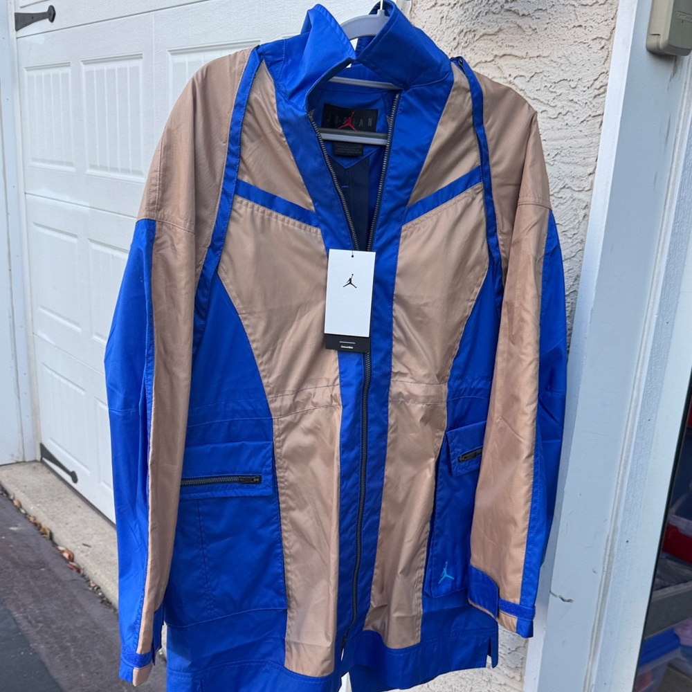 Rare!!! Jordan women’s 
 Vibrant Blue and Tan Windbreaker
Price Drop!!